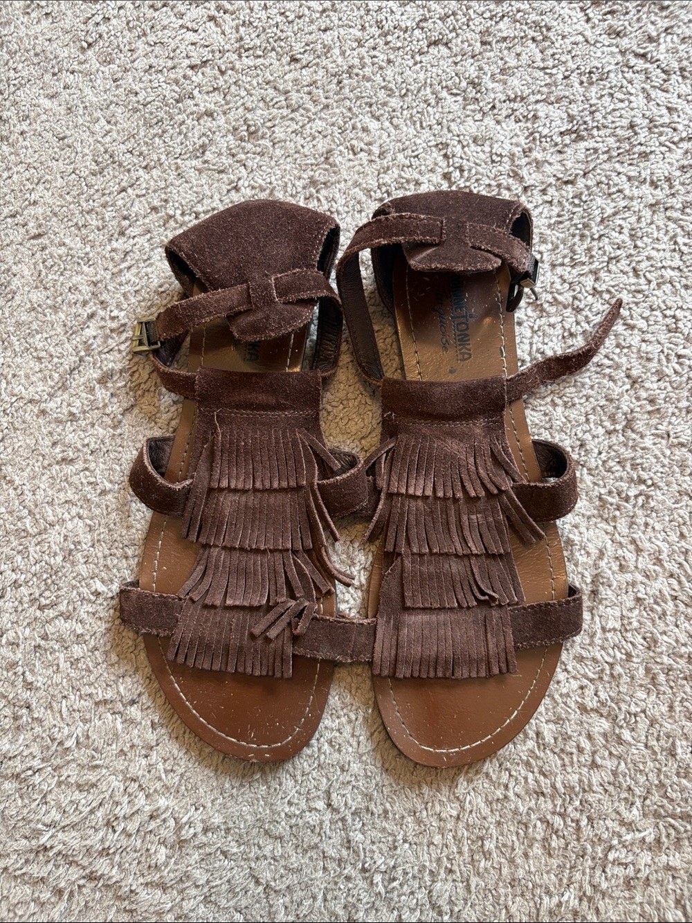 Minnetonka ‘turquoise’ fringe sandals